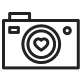 icon of a camera with a heart inside the lens
